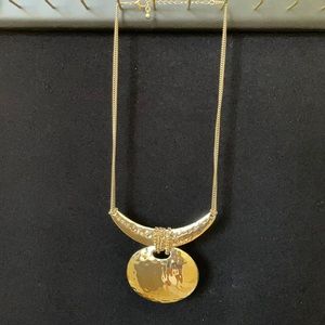 Gold tone statement necklace
